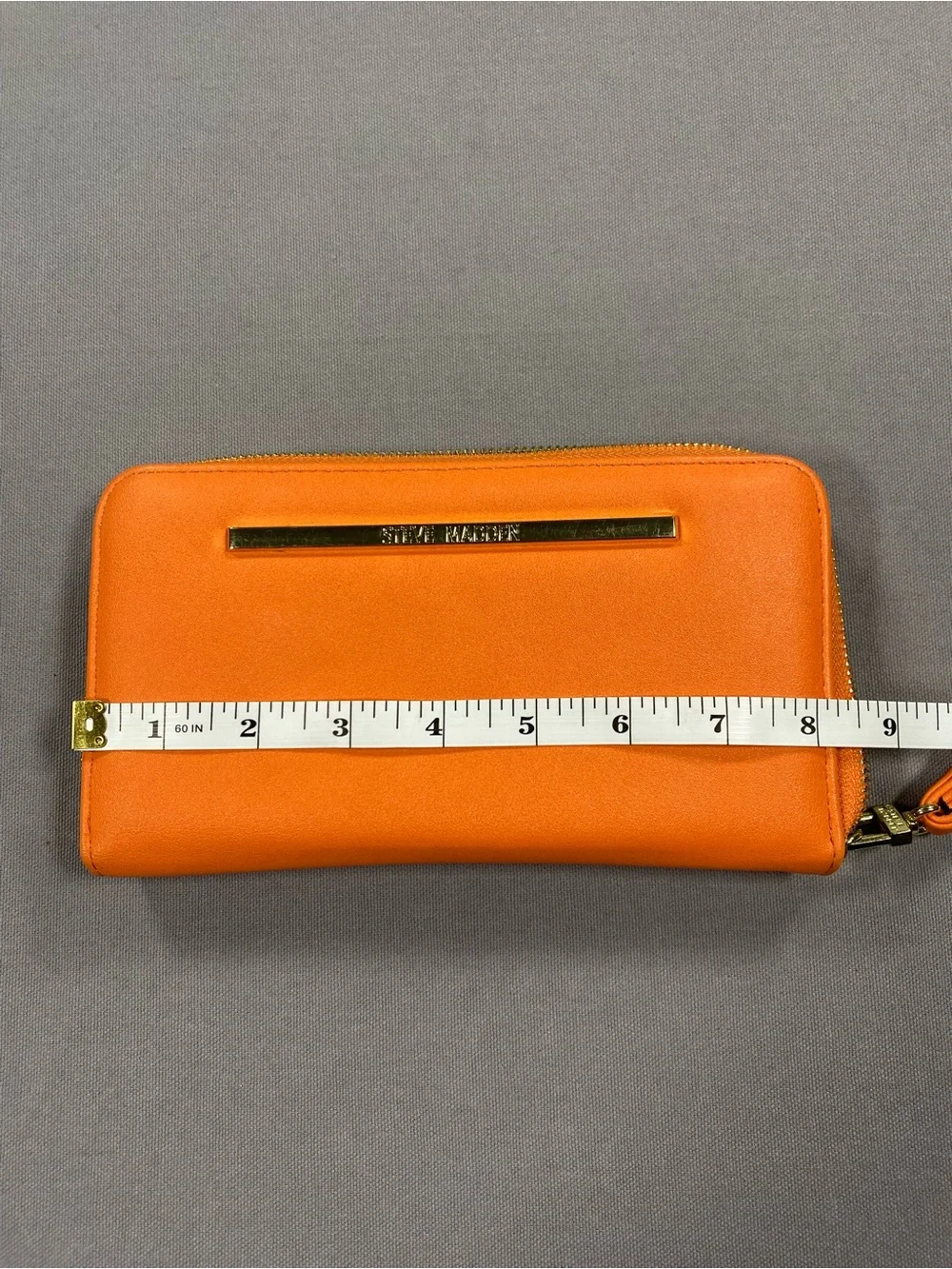 Steve Madden Orange Wristlet with Gold Bar